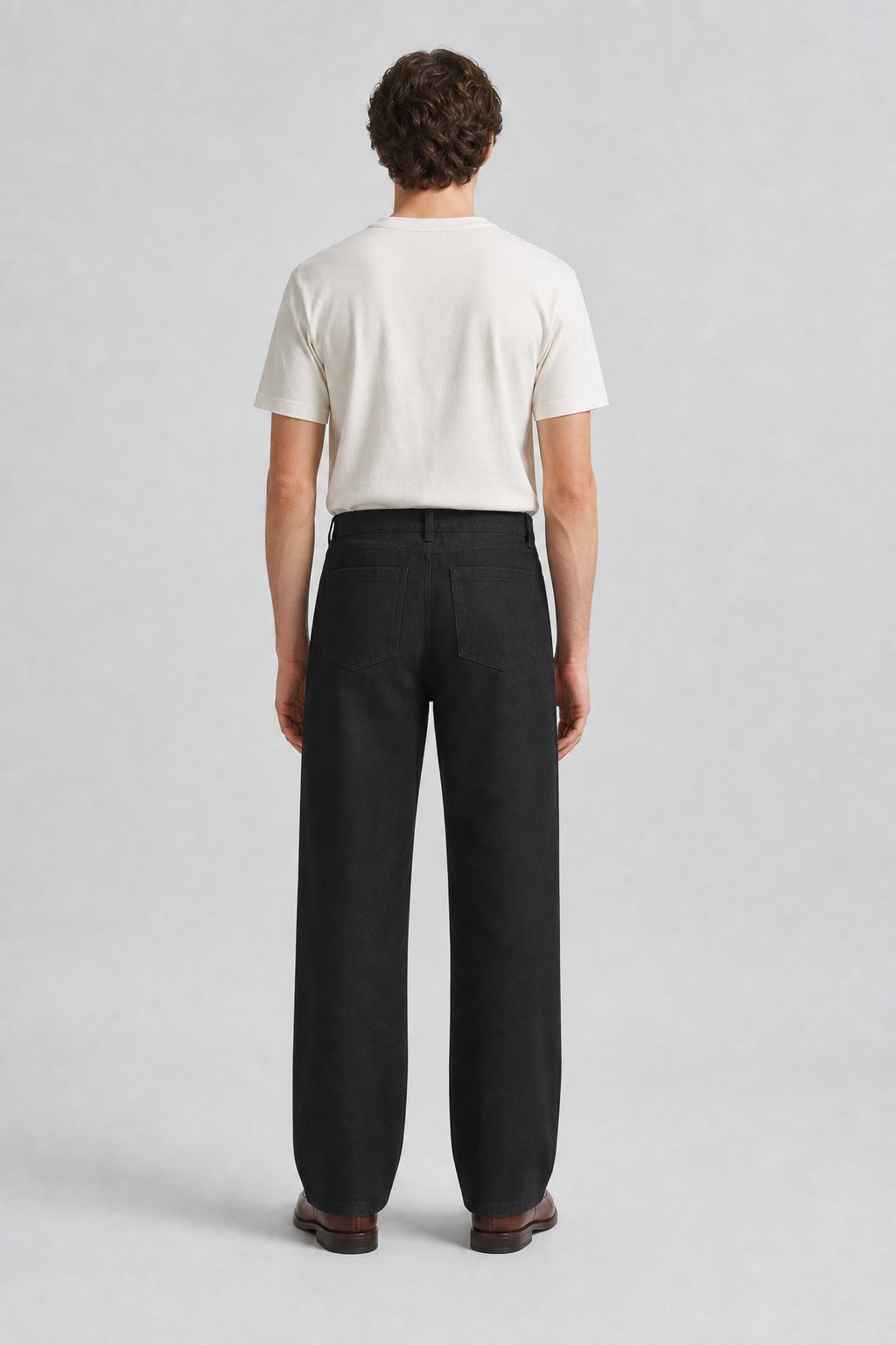 Straight leg cotton trousers in Black — back view
